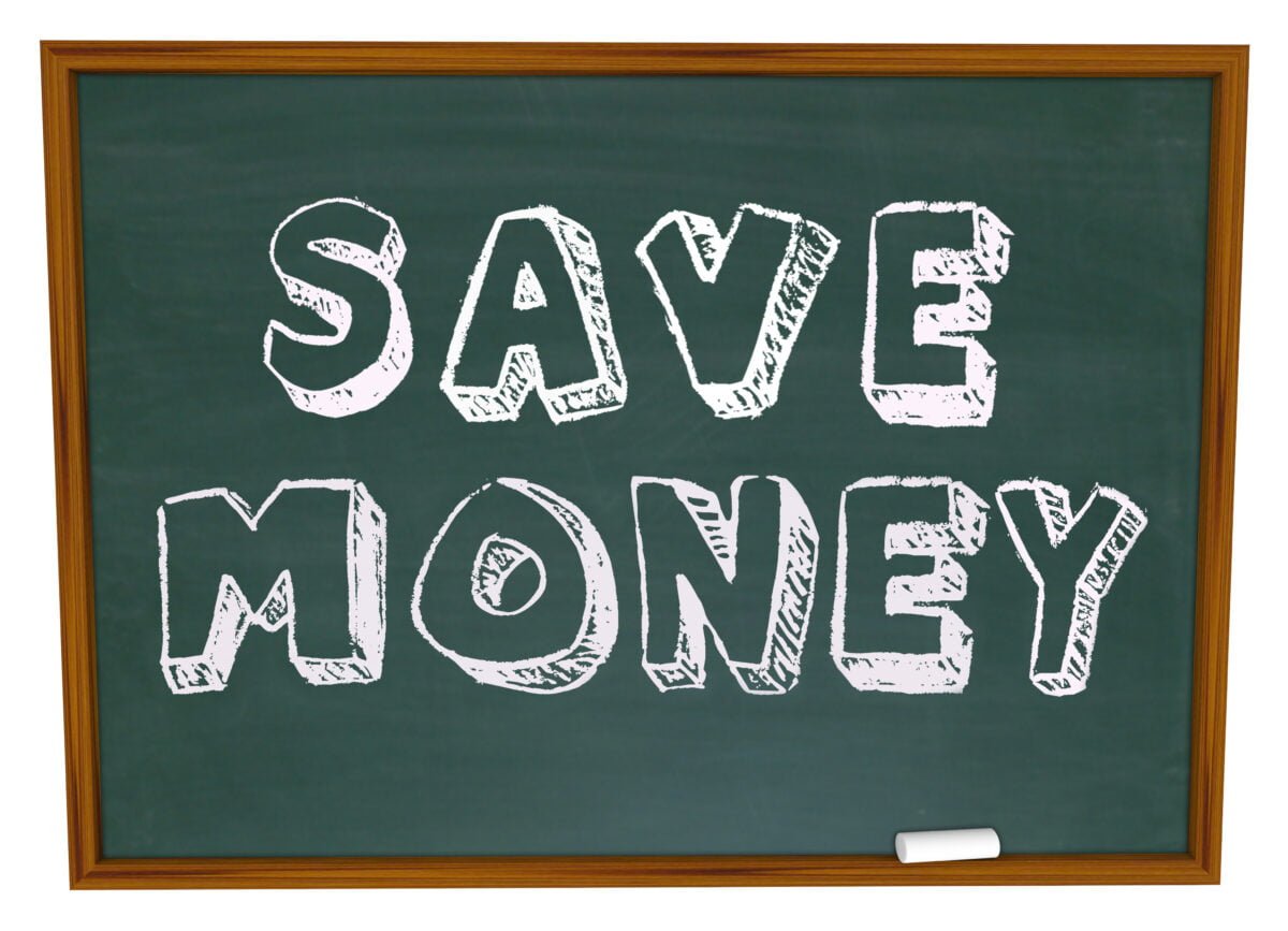 The words Save Money written on a chalkboard with white chalk