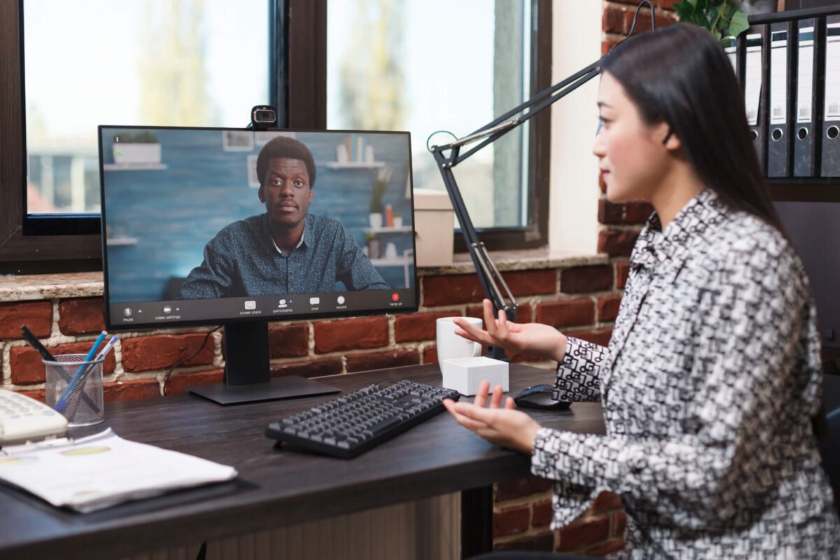 Company project manager explaining misunderstanding at work on a conference call