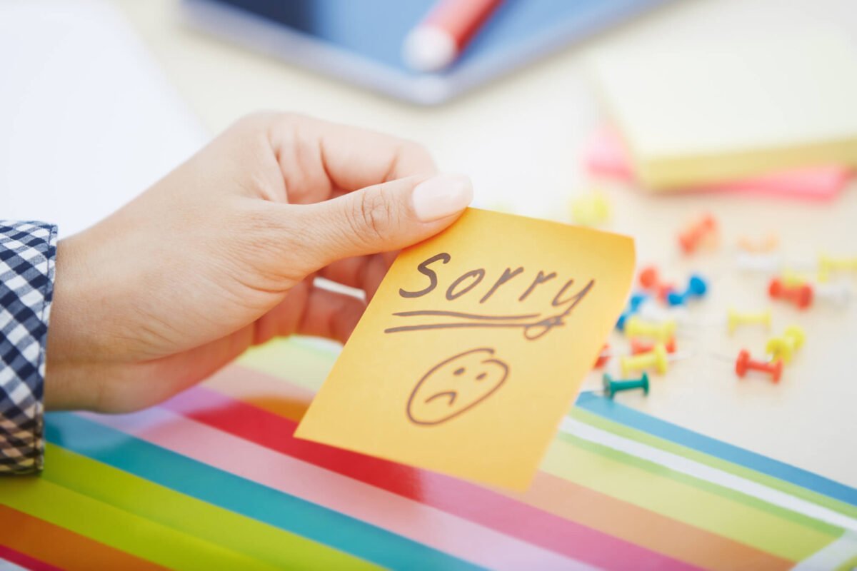 Sorry text on adhesive note