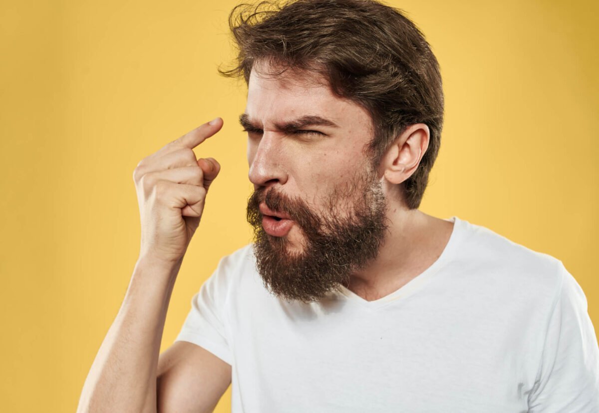 Irritable young man with beard 