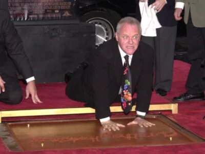 Anthony Hopkins pulling silly face at his handprint ceremony, Chinese Theater, Hollywood, 01-11-01
