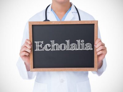 doctor holding up blackboard with the word echolalia on it