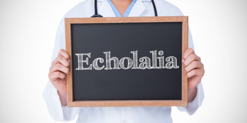 doctor holding up blackboard with the word echolalia on it