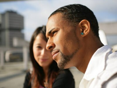 Woman trying to talk to her unresponsive boyfriend who is coming out as autistic