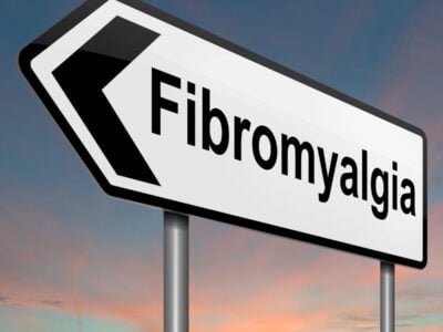 road sign pointing left with Fibromyalgia as the destination