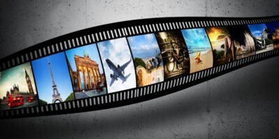Film strip with colorful, vibrant photographs on grunge wall. Travel theme.