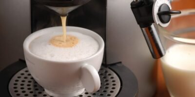 cup of coffee being made on a coffee machine