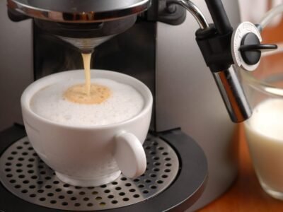 cup of coffee being made on a coffee machine