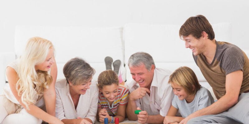 adhd family playing board games in sitting room