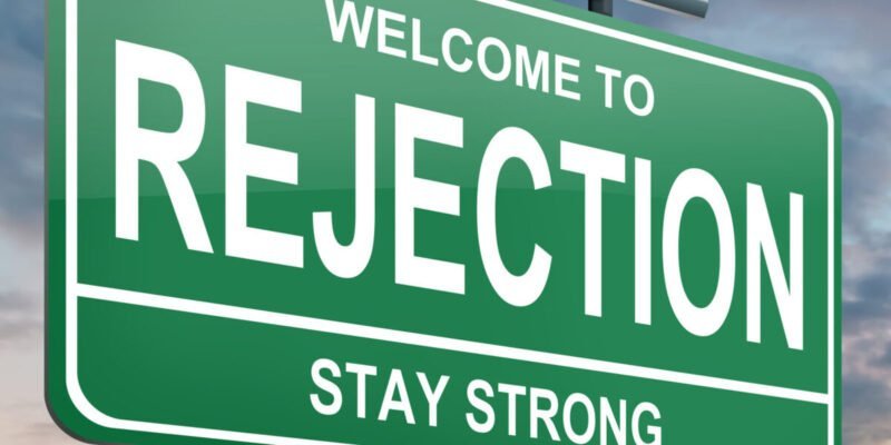 green rejection concept road sign stay strong