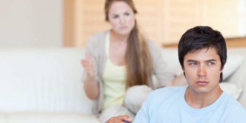 upset adhd couple arguing. woman is arguing at man who has rejection sensitive dysphoria