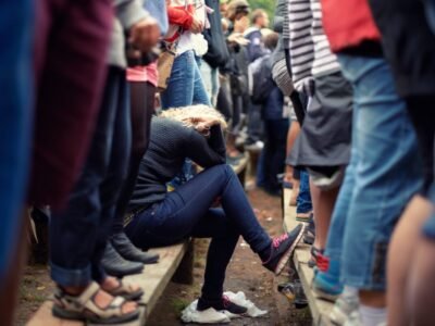 social anxiety girl with head in hands