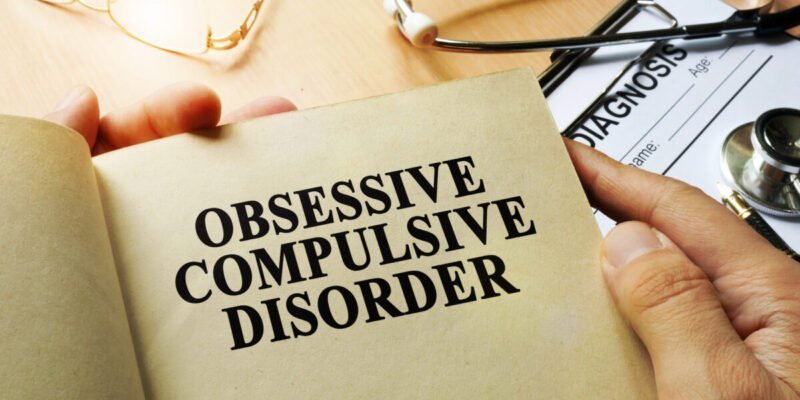 Obsessive compulsive disorder concept. Book on a table.